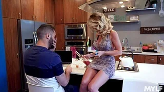 Stepson takes a shot from stepmom's boobies and fucks her cunt in the air the kitchen
